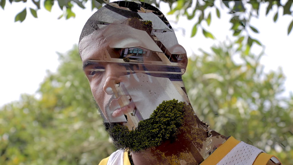 Athlete in a yellow jersey, double exposed with sunlit foliage